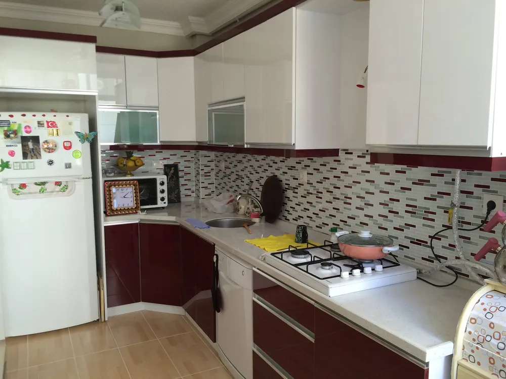Cem Yeşilay Luxury Koyu Füme Mat Lake & Pirinç Kulplu Mutfak (MODEL-22-4) - Buca Adatepe özel mimari imalat
