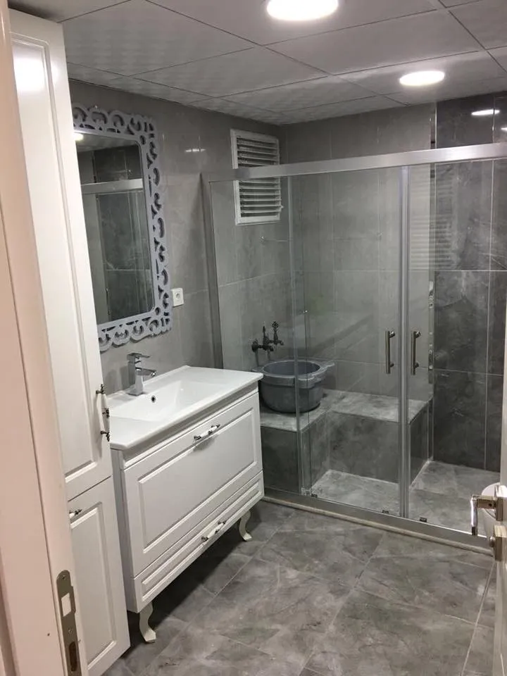 Cem Yeşilay Luxury Porselen Mermer Tezgahlı & Altın Bataryalı Banyo Dolabı (MODEL-6) - Buca Adatepe özel mimari imalat